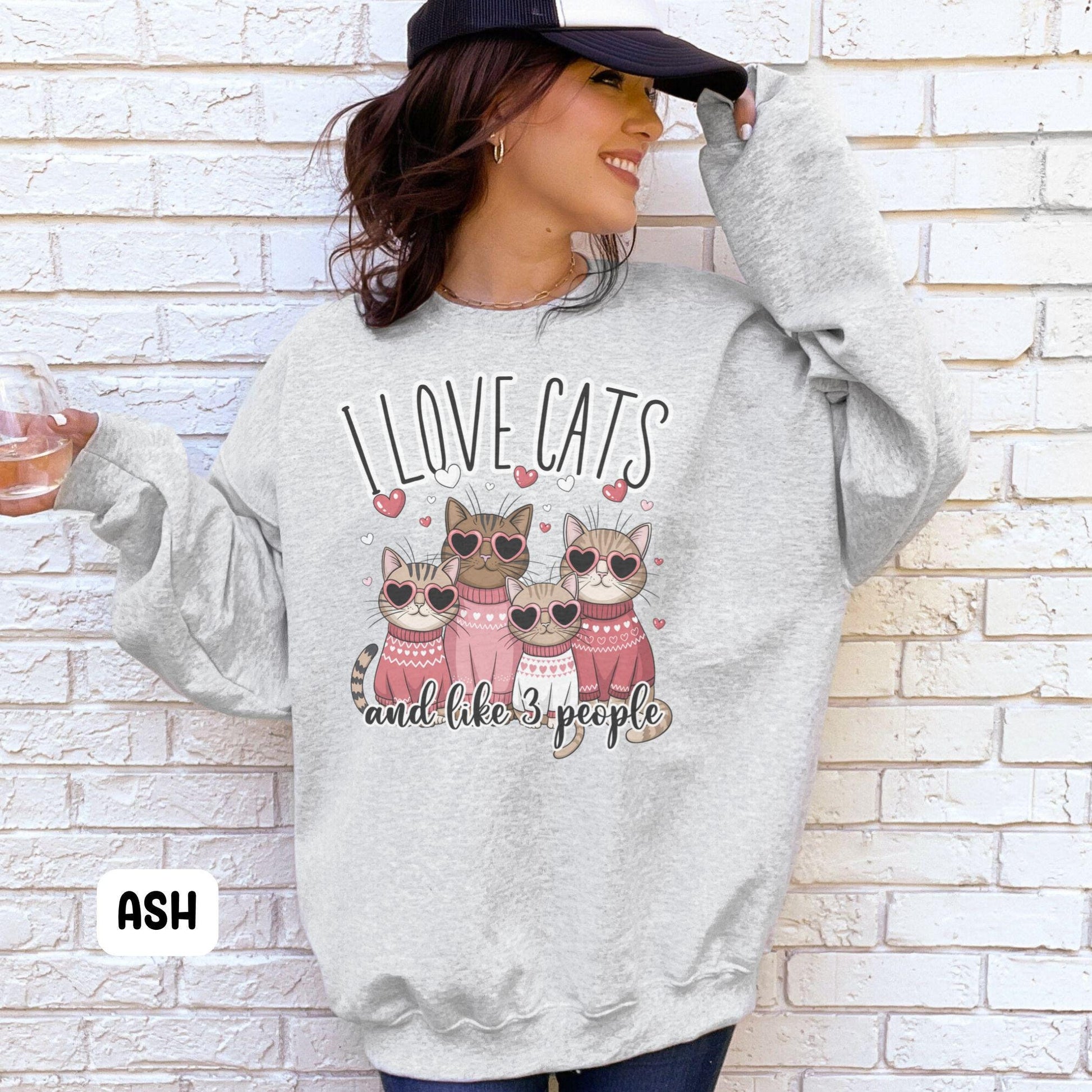I love cats and like 3 people sweatshirt cat valentines sweatshirt cat valentines funny valentines sweatshirt cute cat sweatshirt Sweatshirt – Premium Graphic · High-Quality Print